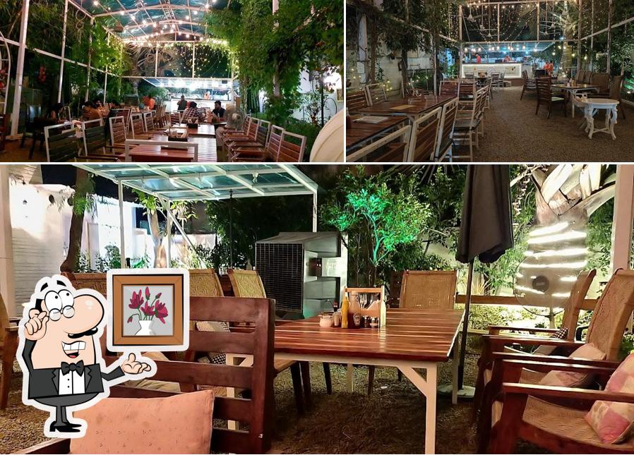 Take a seat at one of the tables at Garden Cafe