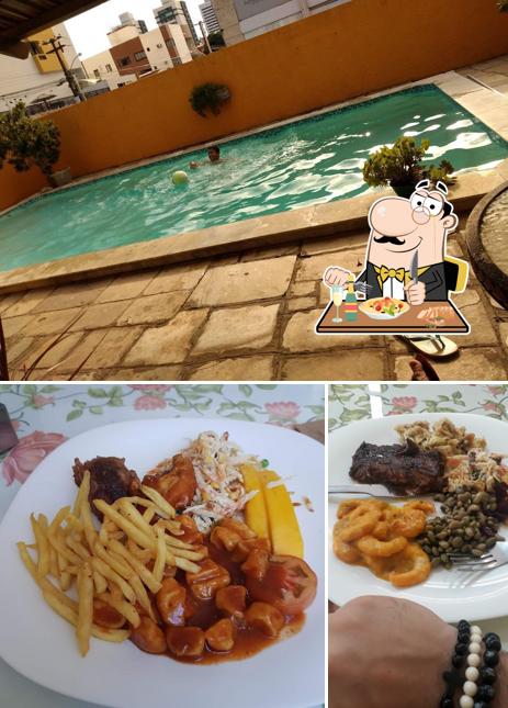 Confira a ilustração mostrando comida e exterior no Restaurante Sardela - Tambauzinho