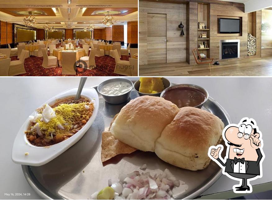 Take a look at the photo showing interior and food at Prapti Pure Veg