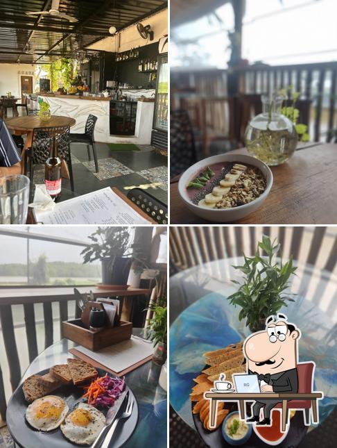 Take a seat at one of the tables at AGAVA restaurant & bar
