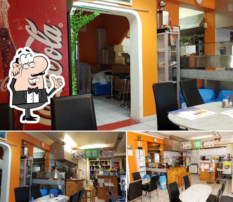 Siediti a un tavolo di Bärenhof Pizzeria