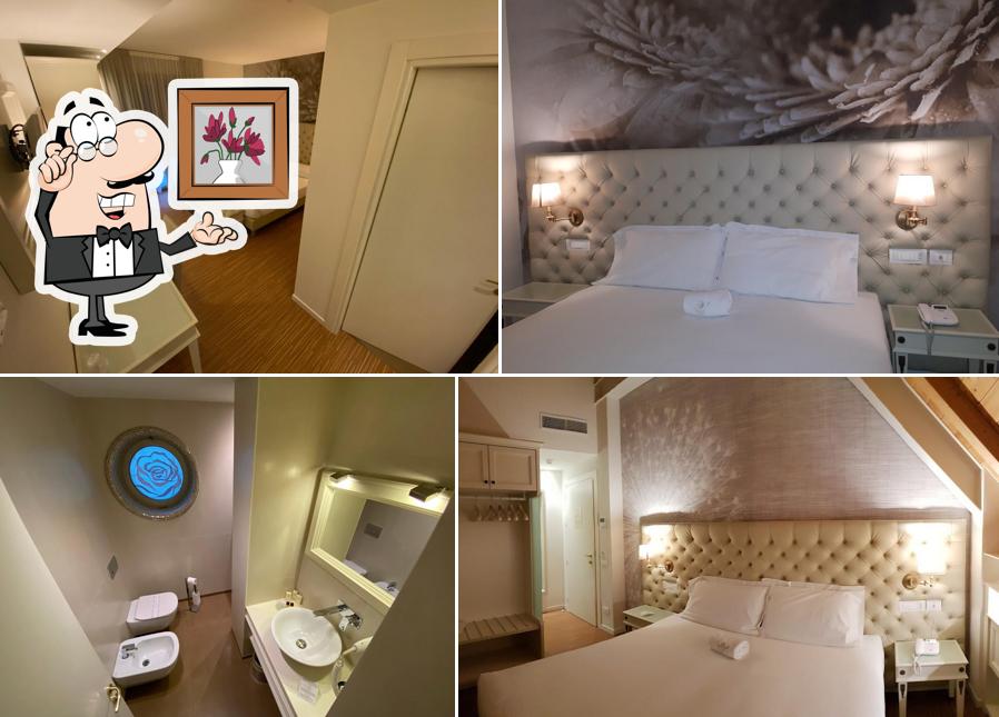 Siediti a un tavolo di Rosa Purpurea Hotel Ristorante Bar E-Bike Wellness Centre
