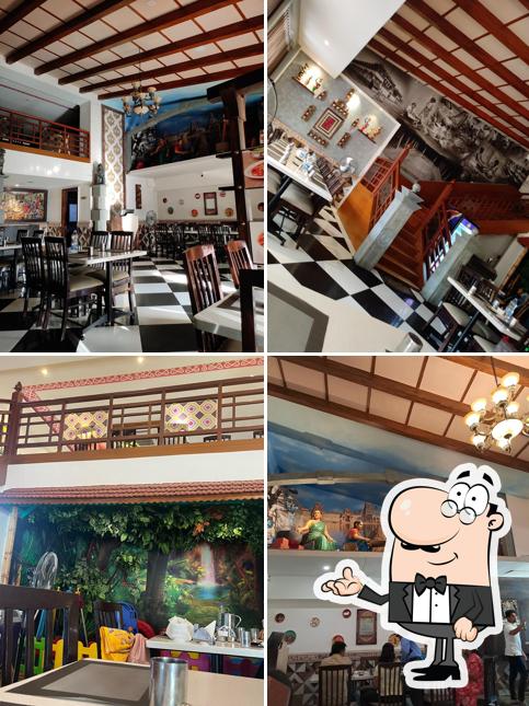 Take a seat at one of the tables at Raaju Sri Rayappas Restaurant