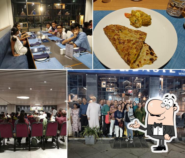 Take a seat at one of the tables at Blue Basil