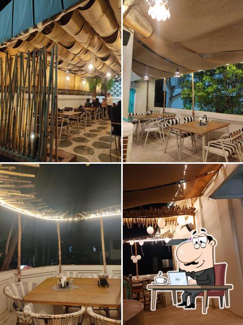 Take a seat at one of the tables at Green Leaf Restaurant & Cafe