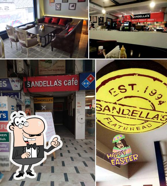 Take a seat at one of the tables at Sandella’s Restaurant Bar & Cafe - Best Coffee Shops in Amritsar