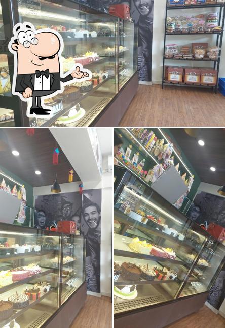 Take a look at the photo depicting interior and food at Ribbons & Balloons - The Cake Shop