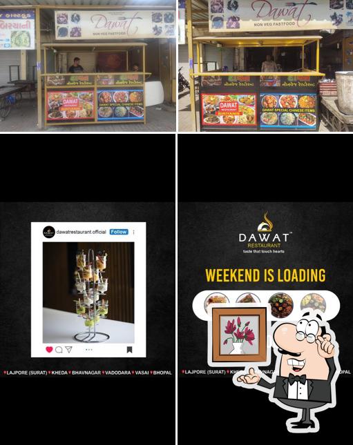 Take a seat at one of the tables at Davat nonveg restaurant