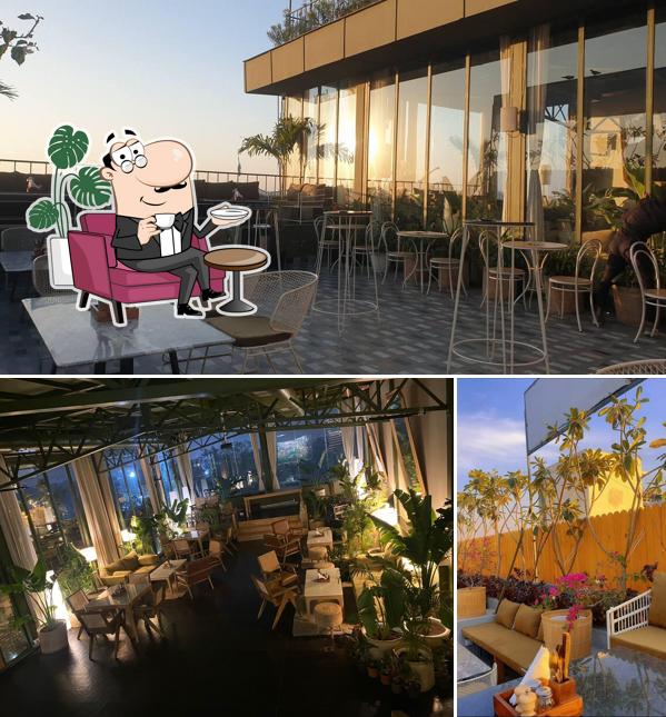 Take a seat at one of the tables at Savanna Sky Lounge & Bar