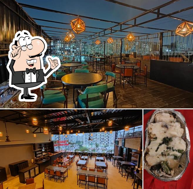 The image of interior and food at Kiara Multi Cuisine Rooftop Restaurant