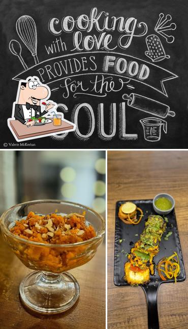 Take a look at the picture displaying food and blackboard at Kailash Parbat