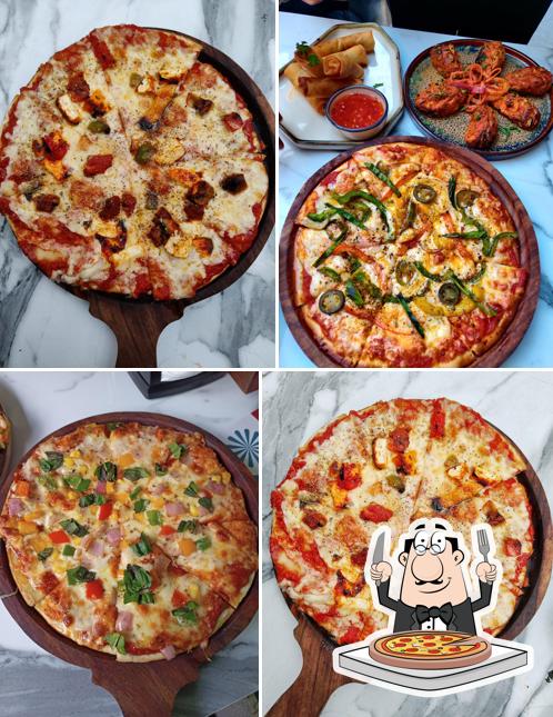 Pick pizza at The Sial Kitchen - Family Restaurant