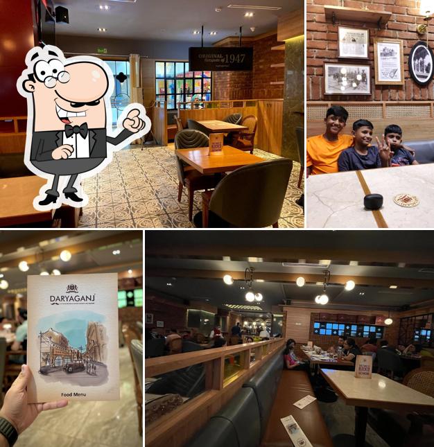 Take a seat at one of the tables at Daryaganj Restaurant