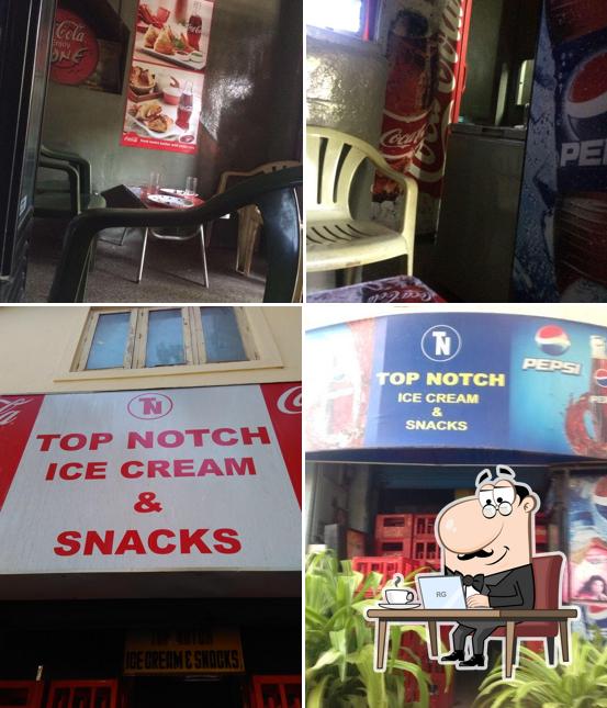 Take a seat at one of the tables at Top Notch