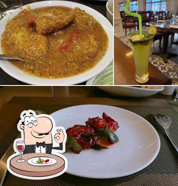 Among various things one can find food and beverage at Hatari Restaurant Madhyamgram