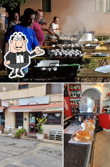 Questa è la foto che presenta la interni e cibo di Bar Number One