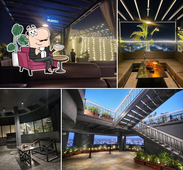 Take a seat at one of the tables at El Dorado - Sky Bar & Club