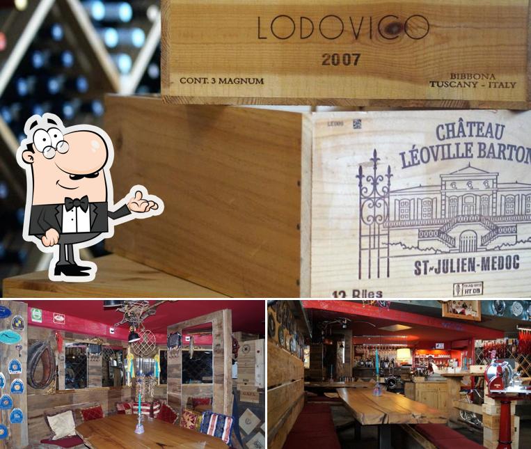 Dai un'occhiata agli interni di Pavarotti Wine Bar