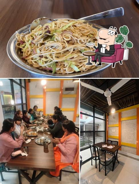 The photo of interior and food at Sambar House Una