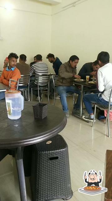 Get pizza at Desi Zayka