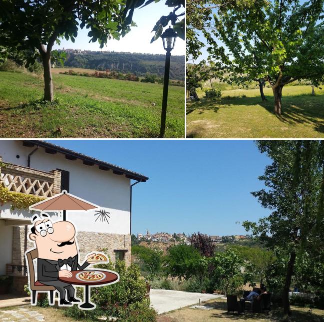 Puoi goderti l'aria fresca da seduto all'esterno di La Locanda Del Picchio