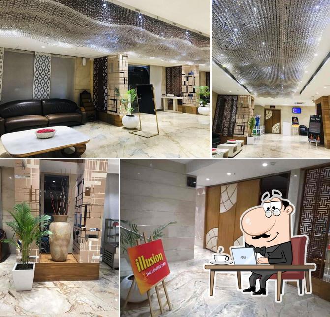 Illusion - Clark's Inn Suites