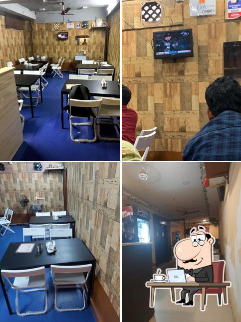 Take a seat at one of the tables at Radhe Family Dhaba