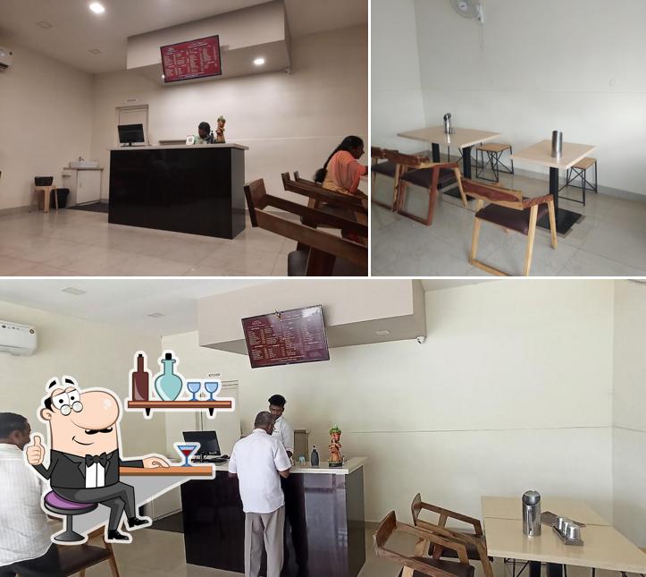 Take a seat at one of the tables at Magilam Non-veg Restaurant