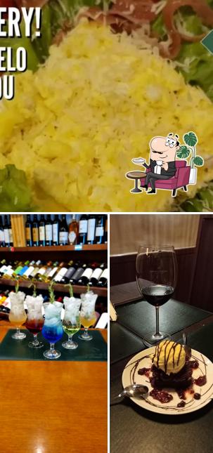 A imagem da interior e comida a Reservado - Restaurante & Adega