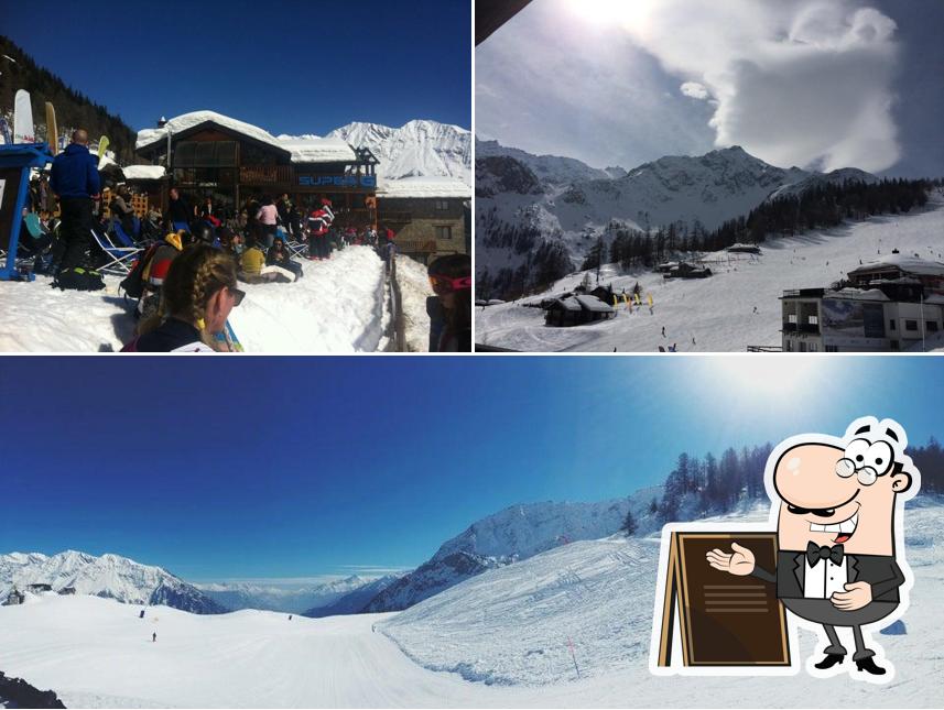 Puoi goderti l'aria fresca da seduto all'esterno di Super G Italian Mountain Club - Courmayeur