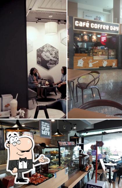 Take a seat at one of the tables at Café Coffee Day