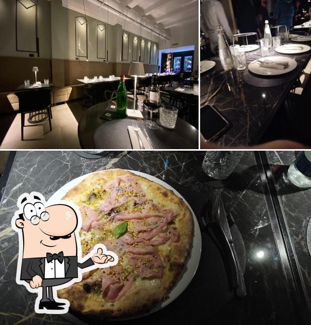 La immagine di interni e pizza da Plomo Contemporary Food