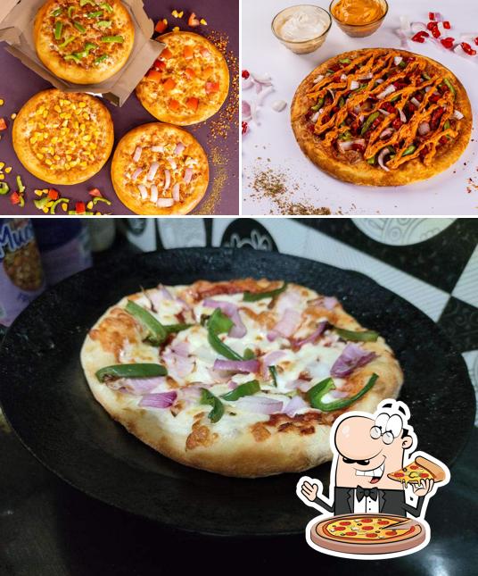 Try out pizza at Rominus Pizza And Burger