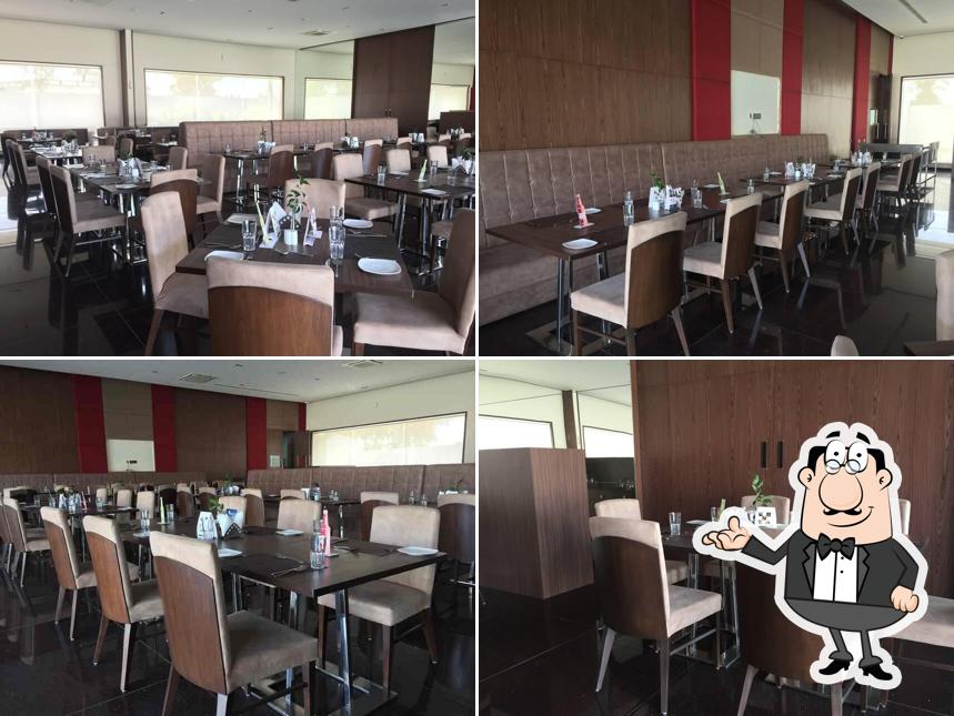 Take a seat at one of the tables at Savannah - Club Babylon