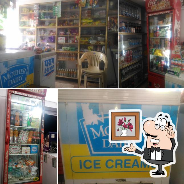 The interior of PARAG MILK DAIRY MOTHER DAIRY,ICE CREAM,FROZEN MATAR PEA MUSHROOM VEG CORN FRIES,REDBULL HELL