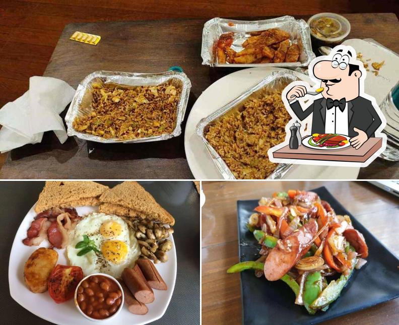 Check out the picture displaying food and interior at Romans Cafe