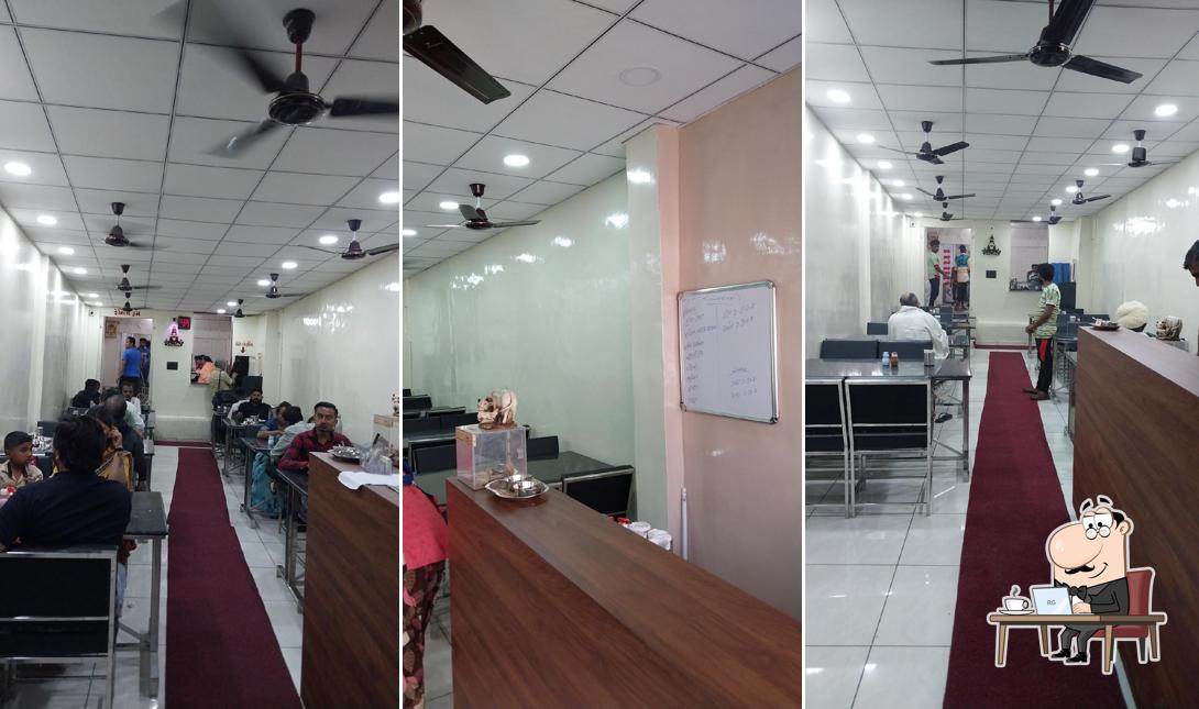 Take a seat at one of the tables at Balaji Dining Hall
