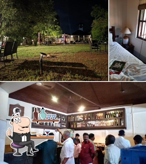 This is the picture depicting interior and bar counter at Methanam Bar