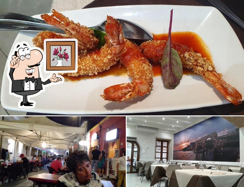 Questa è la immagine che presenta la interni e cibo di Ristorante Pizzeria Ciccittu