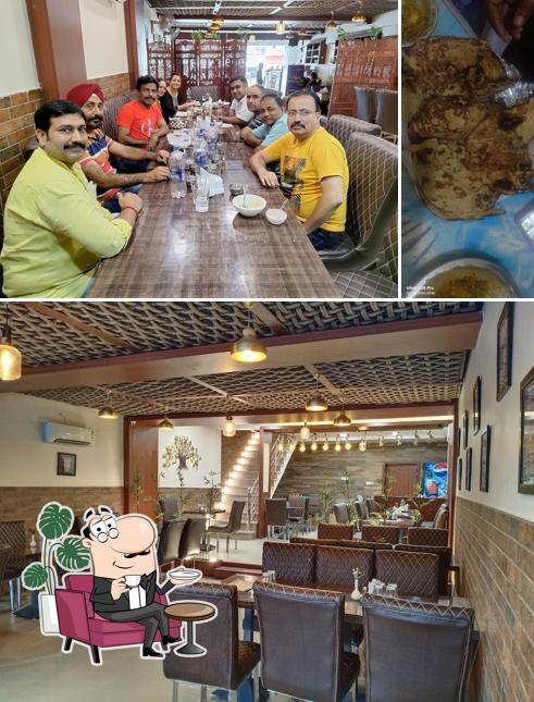 This is the photo showing interior and food at Kesar Dine - A Multi-cuisine Restaurant