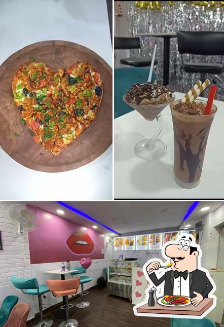 Check out the picture displaying food and interior at Mon Amour