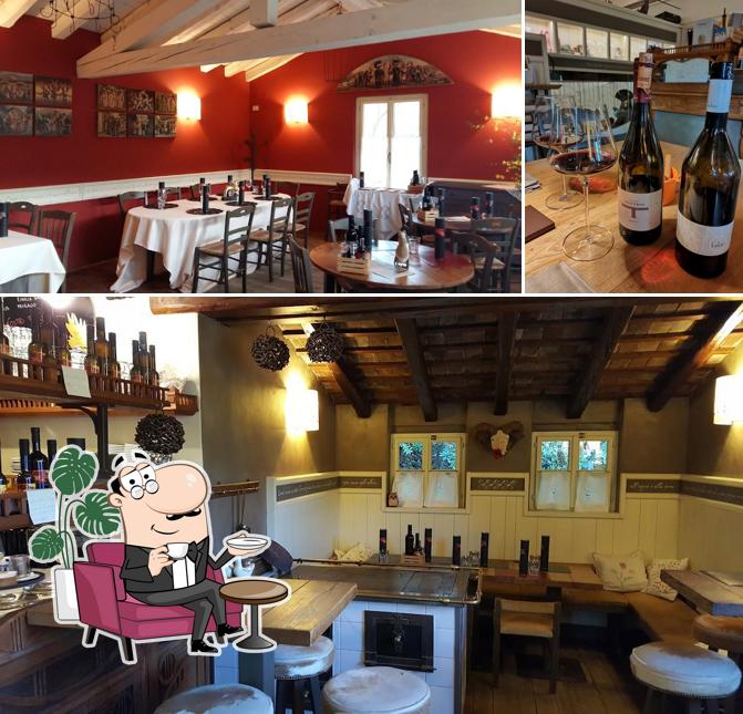 La foto di interni e vino da Osteria La Preda - La Subida