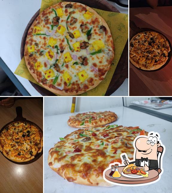 At Cafe d'lite Best Cafe in Rajpipla Best Fast Food Cafe Best Family-Friendly Cafe in Rajpipla Best Brunch Spot Cafe, you can enjoy pizza