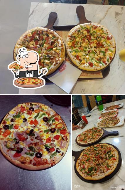 At Dienoz pizza (vikas nagar), you can enjoy pizza