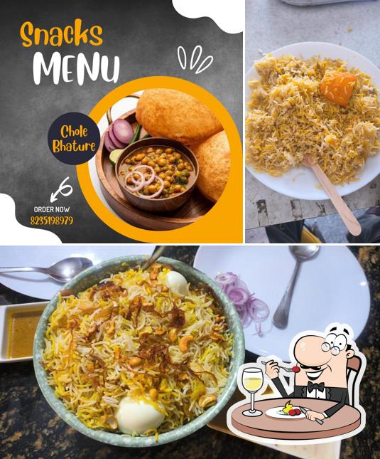 This is the photo displaying food and interior at Calcutta Awadhi Biryani