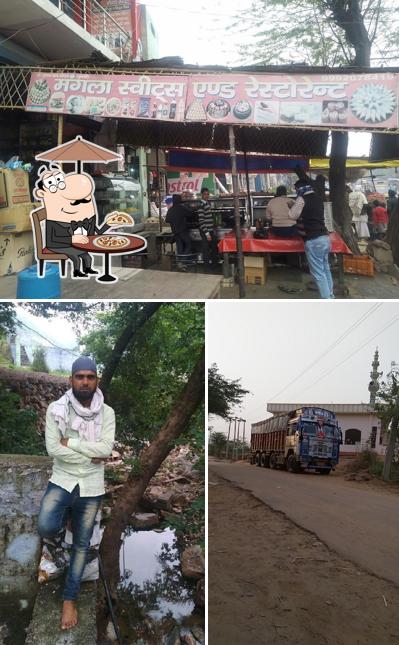 Enjoy the view at the outside area of Mangla Sweets & Restaurant