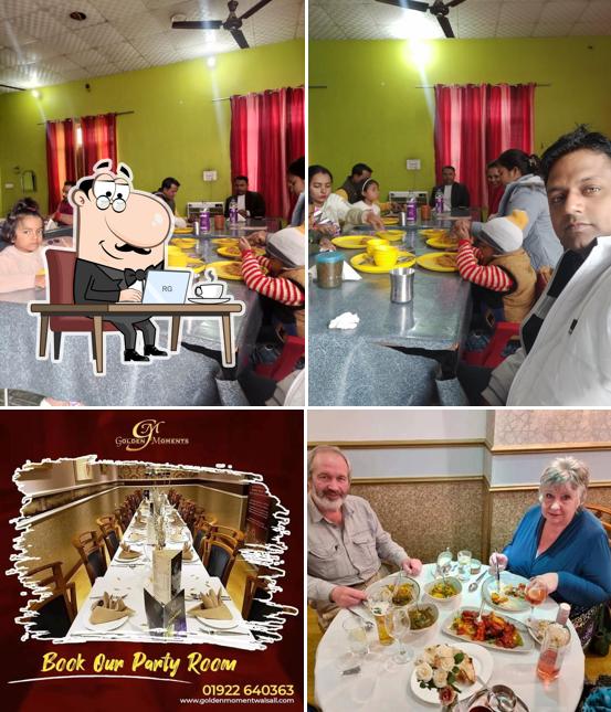 Take a seat at one of the tables at Golden Moment Restaurant