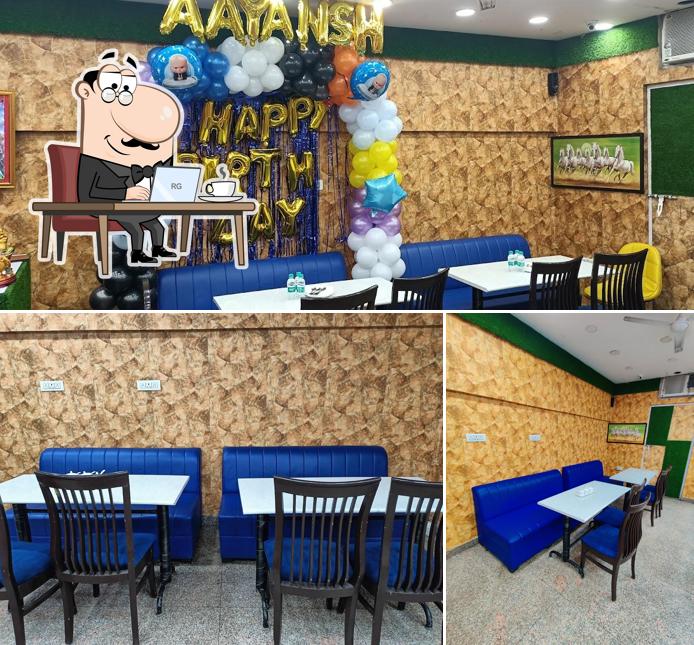 Take a seat at one of the tables at The Chaat Walk