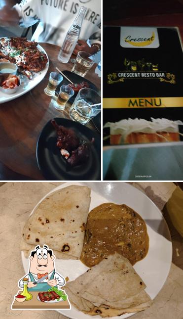 Baby back ribs at Crescent Resto Bar