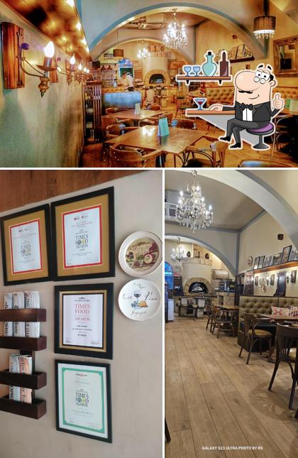 Take a seat at one of the tables at Cafe Nomad